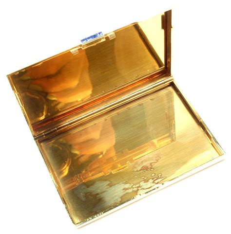 14k gold business card holder.